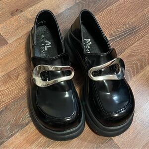 Black Loafers with Silver Buckle